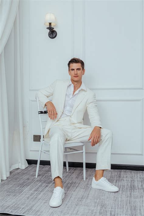 All white wedding outfit men.  Shop In-Store or Online.  Consider the wed...