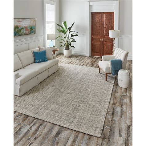 Shop allen + roth Koralin 8 x 11 Ivory Indoor Floral/Botanical Oriental Area Rug in the Rugs department at Lowe's.com. Koralin will add a touch of class to any room of your choice. A delicate ivory background with a regal red border is an updated version of a traditional style..