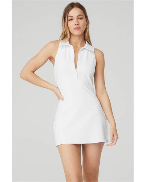 Alo yoga dress. This tennis dress is c-u-t-e. It has a preppy polo collar, a mid-thigh-length hem, and an easy, relaxed fit. It’s done in soft, smoothing Airbrush and finished with a quarter-button placket … 
