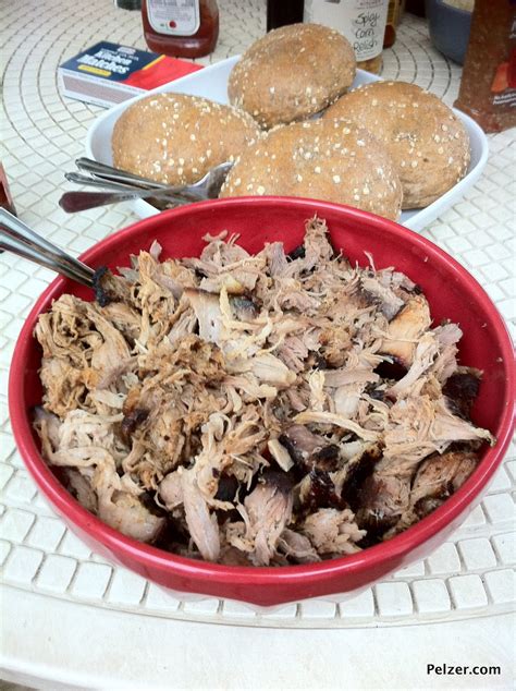 Alton brown pulled pork. I use Pig Dust with a 20-25% brown sugar rub. Then, I slather it in Peach preserves, and smoke with peach wood. It is delicious. Our daughter, who refused to eat pulled pork, grabs it by the handful and shoves it in her mouth. She says it is the best food she has ever had. 