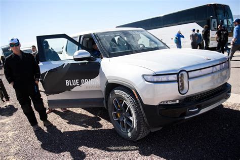 Amazon, Ford hit by massive losses on Rivian investments