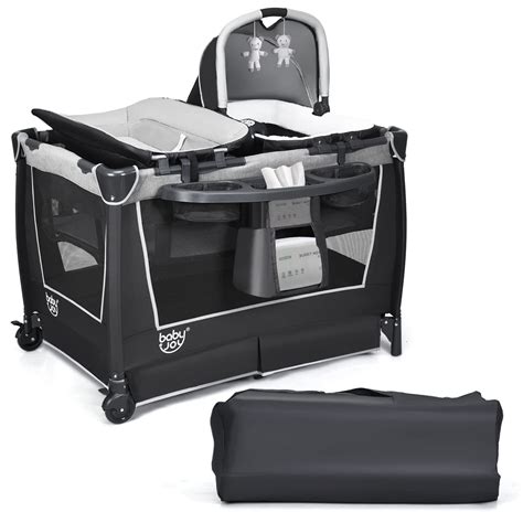 Amazon.co.uk: travel cot with wheels