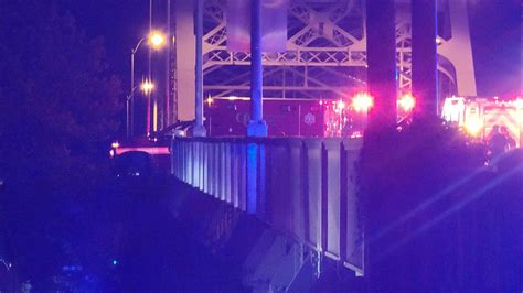 Ambulance removed after hanging over side of bridge