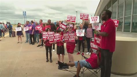 American Airlines passenger service workers picketing for better pay