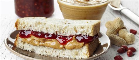 American peanut butter and jelly. Sep 26, 2017 · Place a slice of cheddar on the peanut butter sides and close up the halves to make sandwiches. Melt the remaining tablespoon of butter in a medium skillet over medium heat. Add the sandwiches and cook for 2-3 minutes per side, or until the bread is golden brown and the cheese has melted. Serve immediately. 