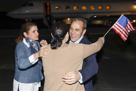 Americans detained for years in Iran arrive in US after release and tearfully embrace loved ones