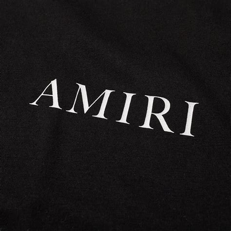 Amiri logo. AMIRI is known for its balance of Californian streetwear-inspired style, with a rock and roll edge. Seen in this pair of jeans, ripped detailing and the cherub logo print adds a rebellious edge to a classic off-duty garment. 
