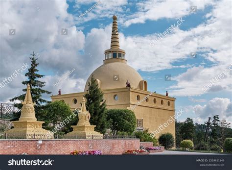 Amitabha buddhist centre.  Circumambulating Stupas and holy objects in a ...
