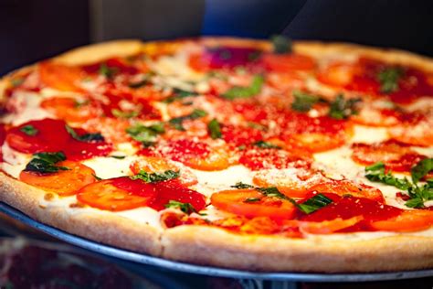 Amsterdam pizzeria reopens in new location