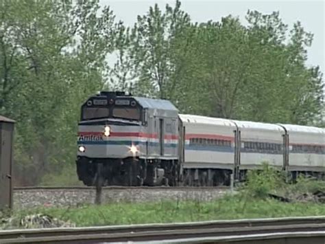 An Amtrak "mixed train" rolls through Gary, Indiana. From the Highball …