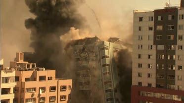 An Israeli airstrike has flattened a high-rise building in central Gaza City after Hamas launched a surprise attack