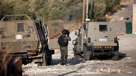 An Israeli raid in the occupied West Bank kills 2 Palestinians, health officials say