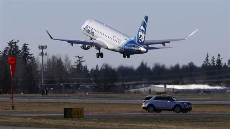 An off-duty pilot tried to take control of Alaska Airlines flight before being subdued