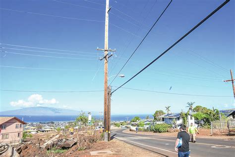 An old car tire, burnt trees and a utility pole may be key in finding how the Maui wildfire spread