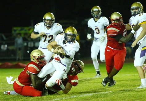 Andrean football. Andrean's Jayden Holmes breaks free to gather some yardage at Friday's Valparaiso at Andrean football game. John J. Watkins, The Times The Andrean Fifty Niners take the field at Friday's ... 