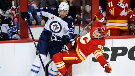 Andrew Mangiapane has 2 goals and an assist, Flames beat Jets 5-3 in opener