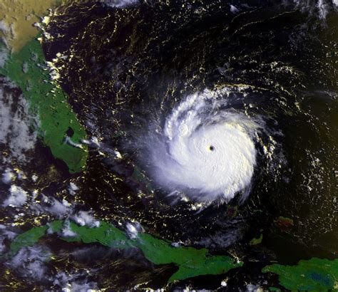 Hurricane Andrew hit southern Dade County, Florida, especially hard, with violent winds and storm surges characteristic of a category 5 hurricane. Maximum sustained windspeeds of 141 miles per hour (227 kph), with gusts of 169 miles per hour (272 kph), were recorded on 24 August 1992 just before landfall in Florida.