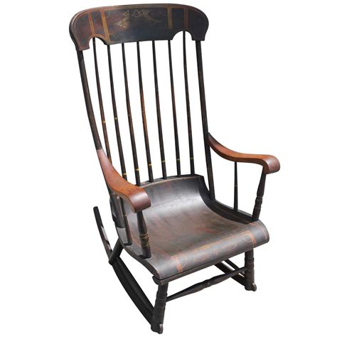 Antique boston rocking chair. The Shaker rocking chair was invented in New York in 1820, and the Boston rocking chair emerged in 1825. Throughout the years, the type of wood used to make rocking chairs has varied, with oak and maple being expected in the 1700s and mahogany being used in the 1800s. ... style, and provenance. Antique rocking chairs, … 