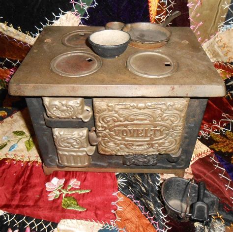 Antique cast iron mini stove. Vintage 1960s 'Queen' Miniature Cast Iron Stove - 5" Salesman Sample/Dollhouse Model with Accessories (17) Sale Price $96.13 $ 96.13 