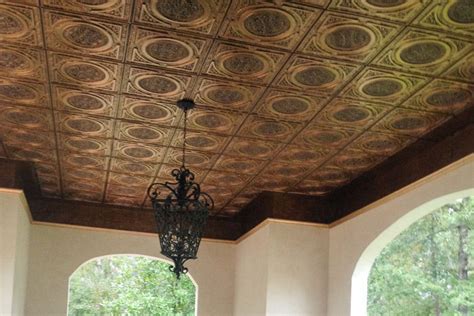 Antique copper ceiling tiles. Our tin ceiling tiles are historically correct, made as the Tin Ceiling tiles were over 100 years ago. HOME - - FLASH - ... Bright Brass, Bright Copper, Bright Chrome, Antique Pewter, Antique Copper, Antique Brass, Solid Copper, Gold, and Powder Painted any colour to fit your decor. 