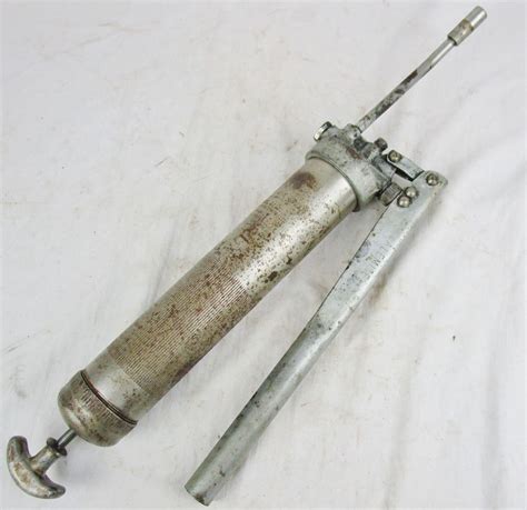Antique grease gun. Things To Know About Antique grease gun. 