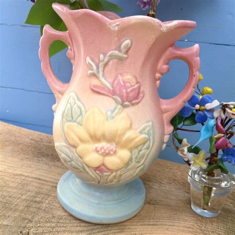 Vintage Hull Pottery Vase, Peach Vase, Pink and Yellow Flower, Vintage Home, Cottagecore, Garden (101) $ 26.00. Add to Favorites Tangerine Vintage Hull Pottery Urn Vase (97) $ 28.00. FREE shipping Add to Favorites Vintage Hull Art Pottery W8- 7 1/2" Pink Wildflower Pink Blue Double Handle Vase .... 