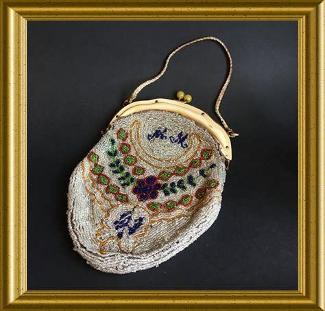 Antique purses beaded. Vintage Beaded Evening Bag Purse/Sparkling Silvery on Black/Drawstring Closure Needs Repair. (234) $24.99. Butterick 6907 / 352 Evening Bags. Six 6 different fabric purses, lined with inside pockets. Beaded, Lace. 