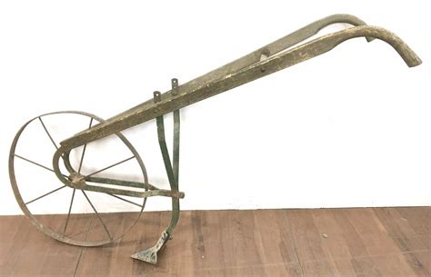 Antique push plow. Things To Know About Antique push plow. 