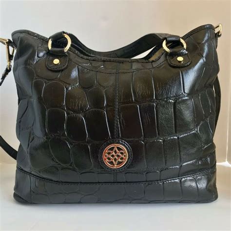 Antonio Melani Shoulder Bag Womens Tan Leather Shoulder Strap Double Handle. $35.94. Was: $44.92. $11.99 shipping. or Best Offer. SPONSORED. ANTONIO MELANI Black …. 