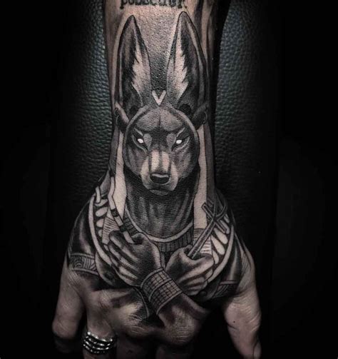 Anubis ruled over this entire realm. The jackal-headed ancient Egyptian god ruled over every aspect of death from the spirits of the dead to the ancient Egyptian burial rites. Anubis is the design for you to get if you are really looking for something unique for yourself. This tattoo looks perfect when etched on hand. See More: Hand Tattoo .... 