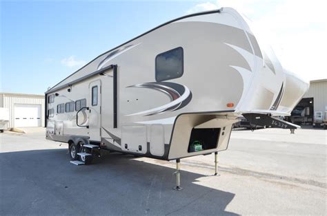 We love camping & want to help you find the right RV so you can make great memories with your family. Come see this hybrid camper at AOK RVs, 621 N. Main, Laurie, MO (Lake of the Ozarks.) 573-374-8113 or 800-769-9990.