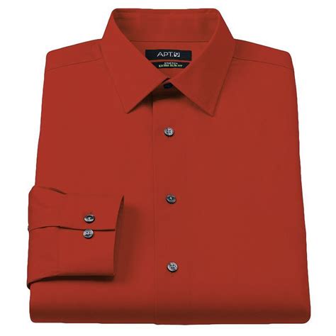 Upgrade your formal attire with the Men's Apt. 9® Slim-Fit Performance Knit Spread-Collar Dress Shirt. This shirt seamlessly blends style and functionality to elevate your look for any occasion. The slim-fit design offers a modern and tailored silhouette that complements your physique. The performance knit fabric is a blend of polyester and ... .