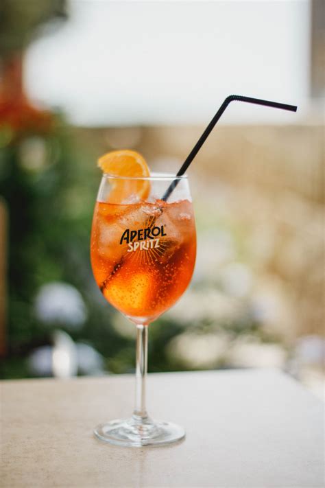 Aperil. Steps. Add the prosecco, Aperol and club soda to a wine glass filled with ice and stir. Garnish with an orange slice. Low- & Non-Alcoholic Drinks. What … 