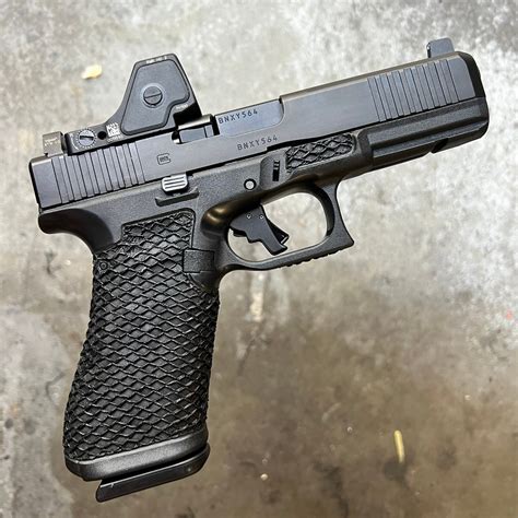 Apex trigger glock 19 gen 5 type 3.  This black slide features an optic cut ...