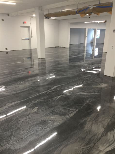 Apoxy floor. What is Epoxy Flooring. Epoxy flooring is a form of synthetic resin flooring which can be installed as a coating on top of existing surfaces. Epoxy resin flooring coating is the name for the system that is laid on top of cement or concrete floors to offer additional protection and decoration. 