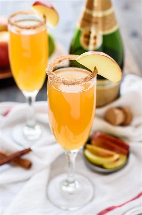 Apple cider champagne. 2 bottles very dry sparkling wine (750 ml bottles) , such as champagne, cava, or Prosecco (I used a brut Prosecco) 2 cups apple cider; 1 1/2 cups diet ginger ale (12 ounces) (from 1 can or poured from a liter bottle) 1 1/2 cups dark rum or brandy (12 ounces) 2 oranges thinly sliced into rounds; 1 cup fresh cranberries 