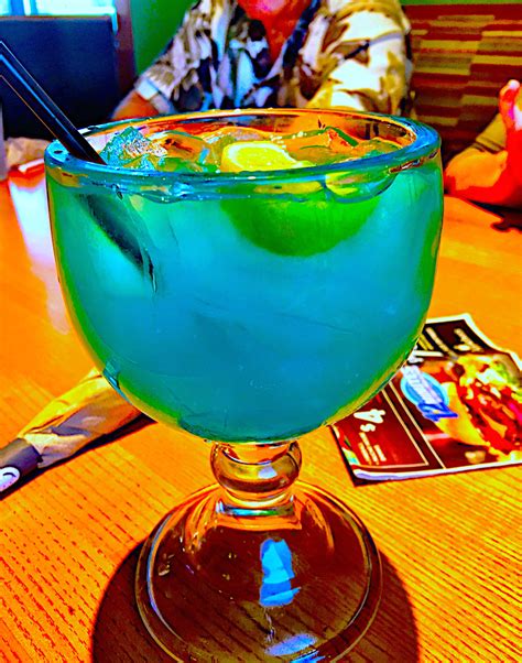 Applebee's has been rolling out some $5 Mucho cocktails over the past few months (which, yes, do fill the holes in hearts left by the monthly $1 drinks...but only barely!). ... melon liqueur, blue .... 