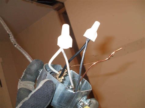 Approved in wall wire splice. To wire a basic light switch, turn off the power to the switch at the breaker, pull the wires to the switch out of the wall, connect the wires to the screws on the sides of the swi... 