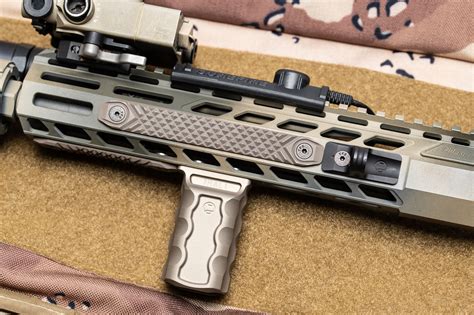The Magpul AFG2 Foregrip is just a bit smaller, which makes it attract