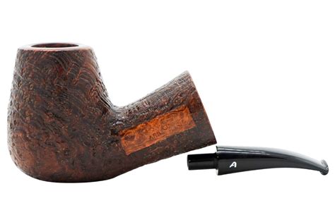 Experience the pinnacle of pipe craftsmanship with the Ascorti Arb SKS Pipe. With its exquisite design and meticulous artistry, this meticulously crafted pipe harmoniously blends classic elegance and modern sophistication. . 