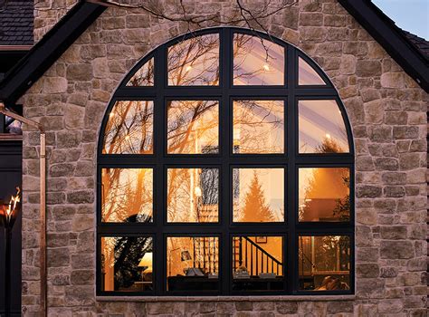 Arc windows. To create an exaggerated style, install a half-circle arch window design at the top of the entrance door. This will lighten the door’s vertical structure and allow for sunshine that will create an impression of a wide area. 3. Reflect the Interior Design of the House with Brick Pointed Arch Windows. 