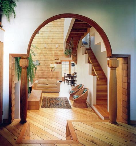 Arch designers. This modern entrance arch design features a pointed arch referred to as an ogival or gothic arch. 5. Horseshoe-Shaped Entrance Arch Designs. If you’re religious and prefer a meaningful home design, a horseshoe arch makes for a great entranceway. The horseshoe is a universally recognised symbol of safety and prosperity. 