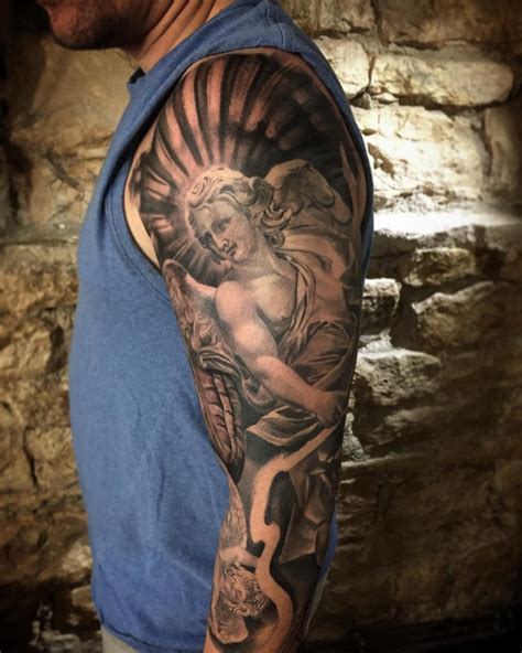 60 Holy Angel Tattoo Designs. You may have come across some beautiful tattoos with holy wings or winged beings. There’s a name for this type of tattoos – Angel Tattoo, which can be done in either masculine or feminine style. Both men and women can get them. You might be curious about why religious tattoos are so popular..