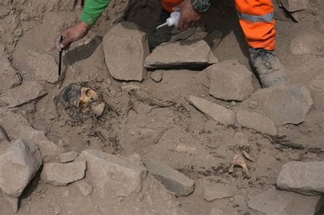 Archeologists find mummy surrounded by coca leaves on hilltop in Peru’s capital