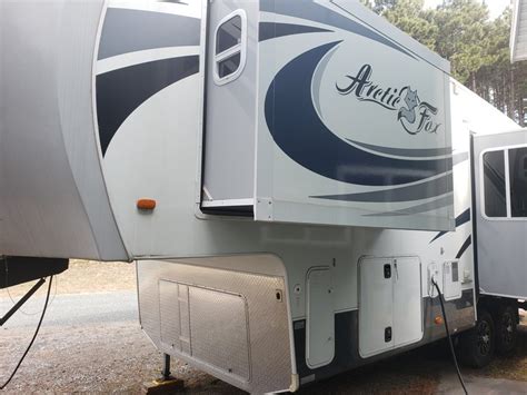 2011 Arctic Fox 5th wheel, Silver Fox 4 seasons edition, Xlnt condition, 4-12v deep cycle batteries, inverter, 100w solar panel, 3.6 Onan propane generator, Heated tanks, Insulated undercarriage, duel pane windows, 76 gallon fresh water tank, Satellite ready, factory installed rear hitch, bedroom & living room slides, 17' electric awning, ceiling fan and fantastic vent fan, 10 gallon water ...
