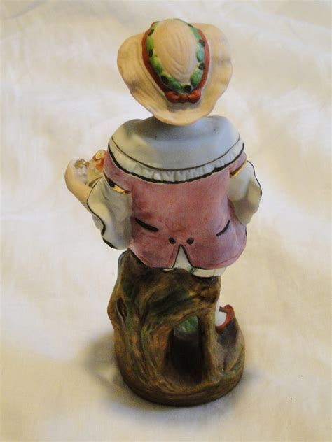 Lot of 2 Large Vintage ARDALT JAPAN HAND PAINTED LENWILE CHINA PORCELAIN BOY & GIRL Figurines carrying baskets. These weigh 2 lbs each and are approximately 12" tall x 5" wide. They are marked on the bottom with a sticker Ardalt Japan. See photos for condition. In very good condition.