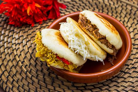 Arepas.. Arepas can be split and buttered, filled, made into sandwiches, served as bread to accompany a meal, or served with a dipping sauce. Some popular combinations for sandwiches or fillings include cheese ( arepas rellenas ), black beans and crumbled cheese, ham and cheese, and scrambled eggs. Basically, you can be creative as you would like … 