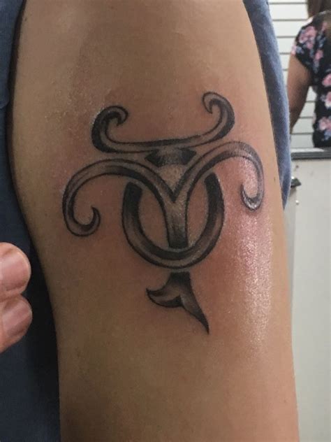 Try a Temporary Tattoo. This is a unique Taurus tattoo des