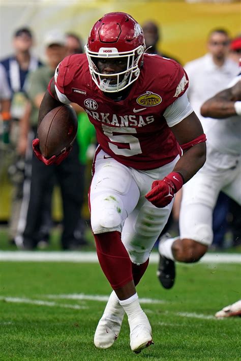 TAMPA, Fla. — It took a while, but Arkansas won the Outback Bowl against Penn State the best way it knew how: running the ball. In front of a crowd of more than 46,000, No. …. 