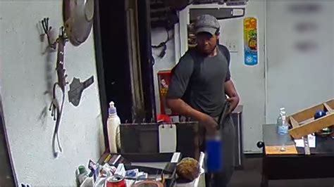 Armed arsonist caught on video using accelerant to start fire at Orange County business